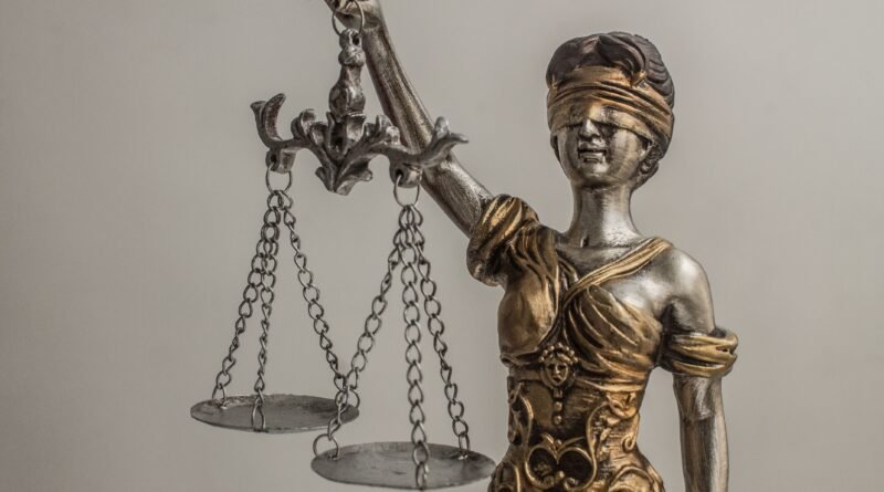 Scales of justice representing the bankruptcy court decision between Chapter 7 and Chapter 13