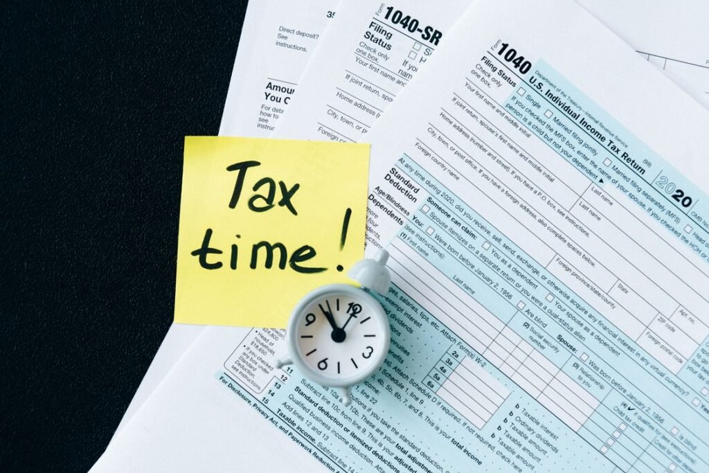 Tax documents on a black table