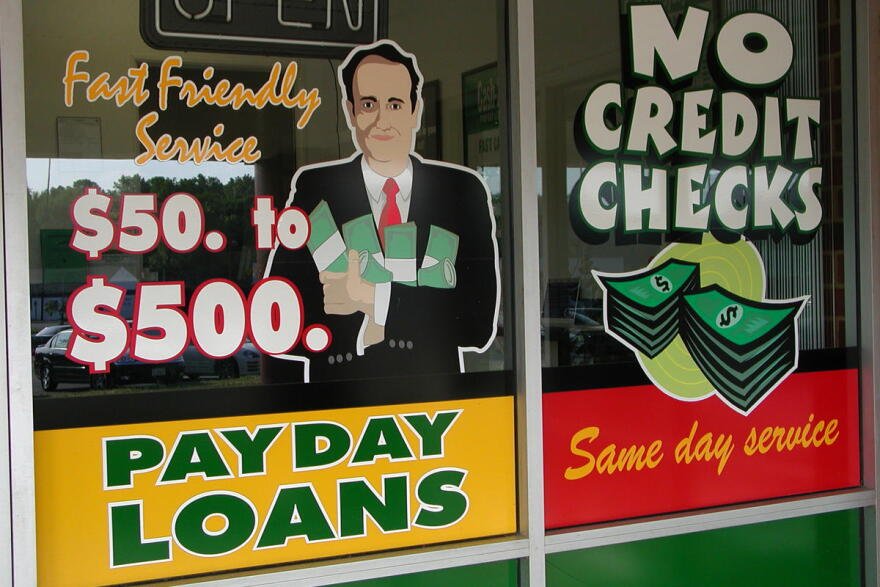 Payday loan storefront with cash advance signage